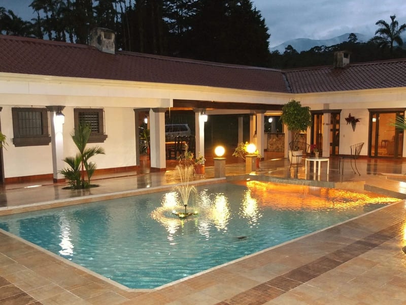 Luxury spring-fed pool at golden hour